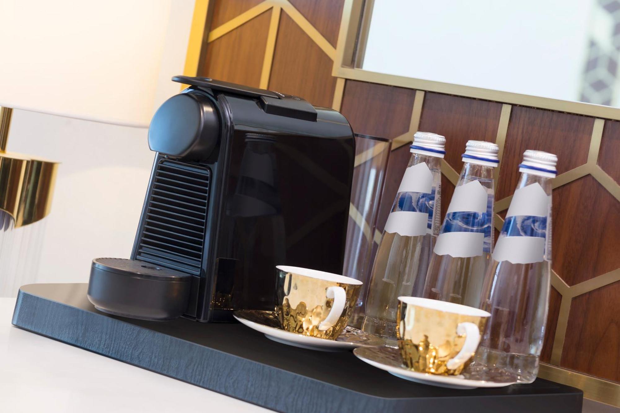 Velero Hotel Doha Lusail Extérieur photo A Nespresso coffee machine